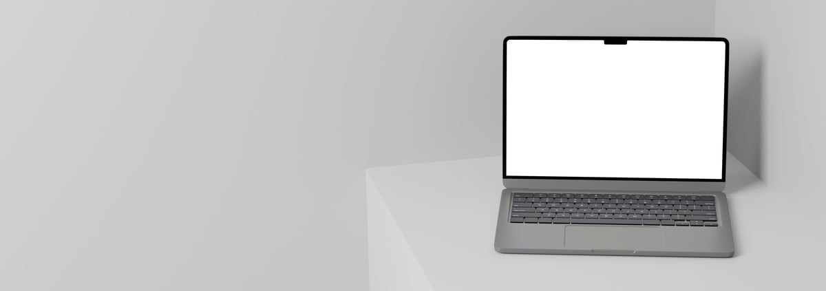A photorealistic 3D rendered laptop mockup featuring a blank white screen, perfect for showcasing UI designs, websites, and digital presentations.