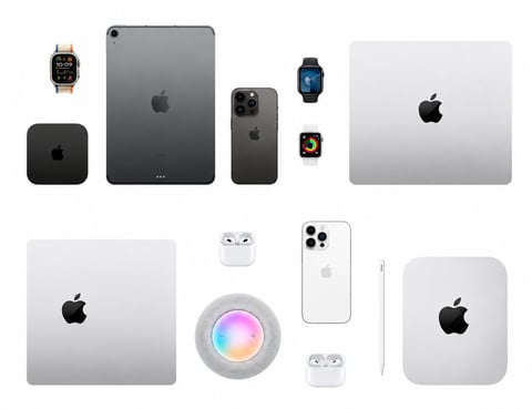 Collection of Apple devices including iPad, iPhone, MacBook, Apple Watch, AirPods, and smart home accessories arranged on white background
